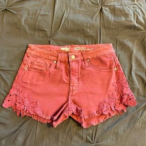 Rusty red denim shorts with matching lace detail